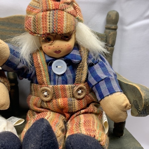 Grandma and grandpa sitting on a wooden bench - Picture 3 of 6